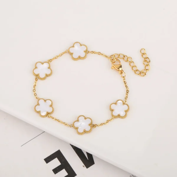 Bracelet trèfle blanc nacré or