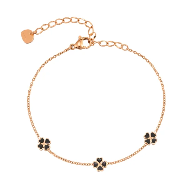 Bracelet or rose avec trèfles à 4 feuilles noirs
