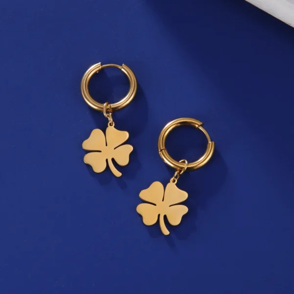 Boucles d'oreilles créoles trèfle 4 feuilles dorées classiques