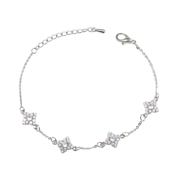 Bracelet avec trèfle 4 feuilles cristaux argentés