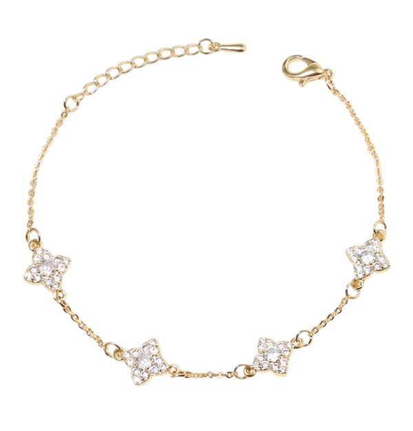 Bracelet avec trèfle 4 feuilles cristaux dorés