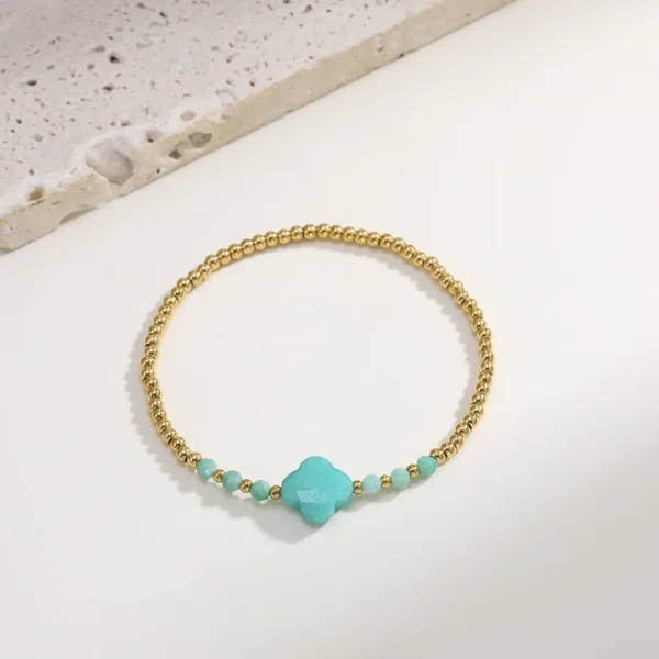 Bracelet trèfle 4 feuilles bleu avec perles dorées