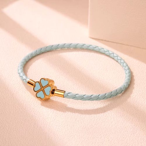 Bracelet trèfle tressé doré et bleu ciel