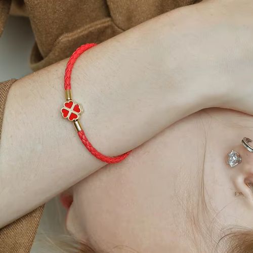 Bracelet trèfle tressé doré et rouge