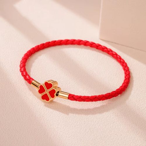 Bracelet trèfle tressé doré et rouge