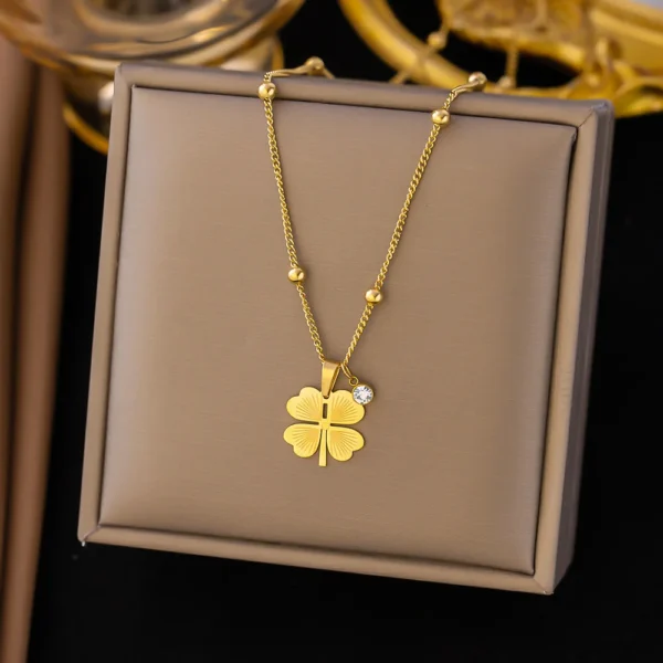 Collier trèfle 4 feuilles doré avec pendentif cristal