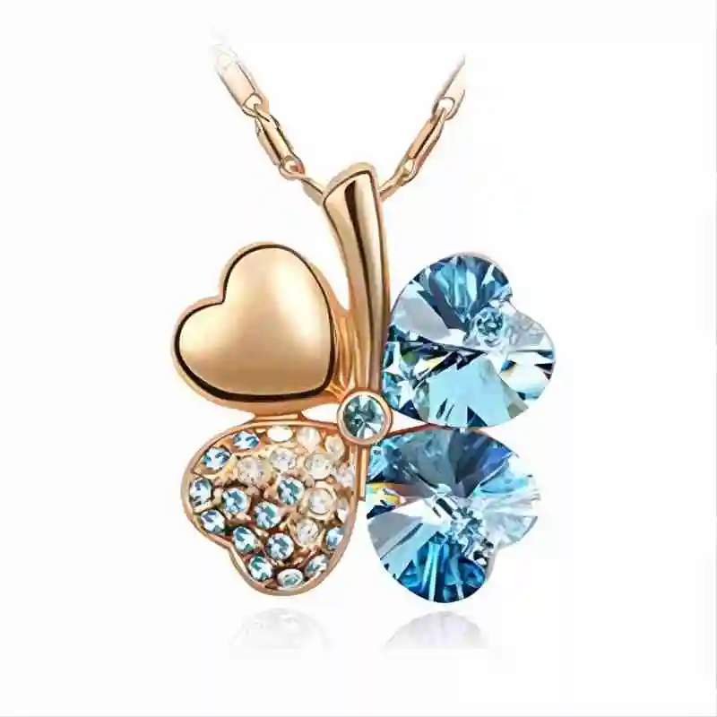 Collier trèfle à 4 feuilles design doré avec cristaux bleus clairs