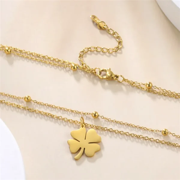 Collier trèfle or avec chaîne double