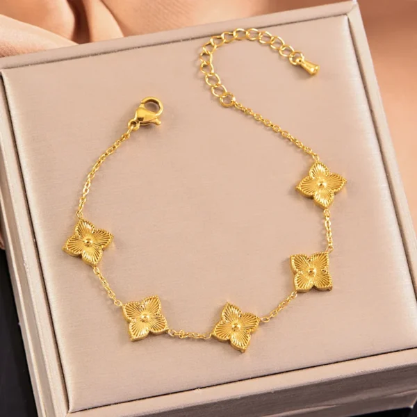 Boucles d&rsquo;oreilles trèfle à 4 feuilles dorées fines